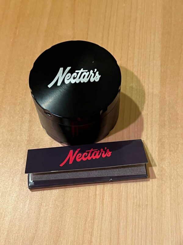 Nectar's branded grinder and rolling papers